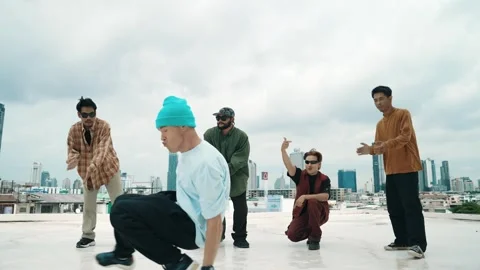 Profession break dancer practice B-boy dance with friends at roof top. hiphop. Stock Footage 275326098