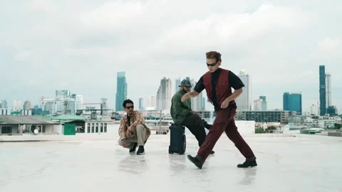 Profession break dancer practice B-boy dance with friends at roof top. hiphop. Stock-Footage 277020958