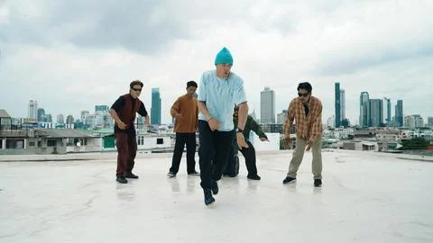 Profession break dancer practice B-boy dance with friends at roof top. Endeavor. 写真素材