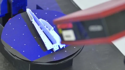 Professional 3D Scanner Scanning an Industrial Object Placed on a Turntable 動画素材 124579816