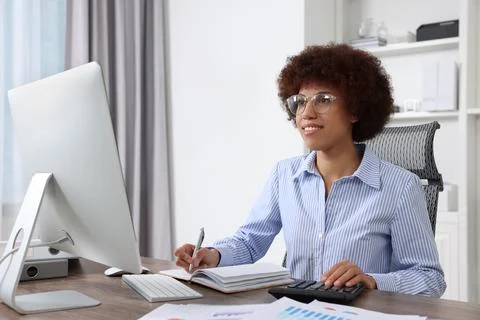 Professional accountant working on computer in office Stock Photos
