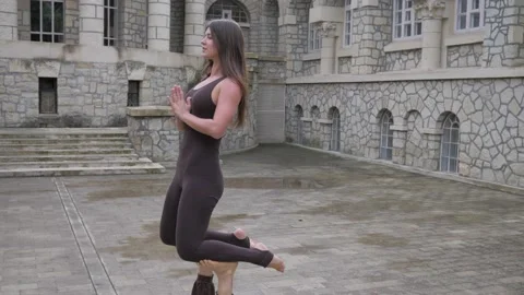 Professional acrobatic yoga. couple practising acro exercises on mat outdoors Video stock 150661115