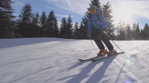 Professional advanced skier skiing on slopes in the Swiss alps Stock Footage 137922445