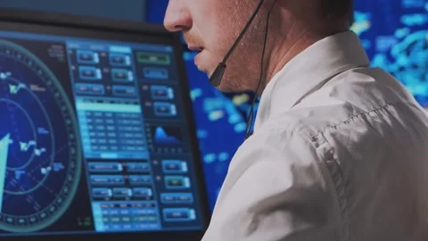 Professional air traffic controller in the control tower. Aircraft control Stock Footage 306945825