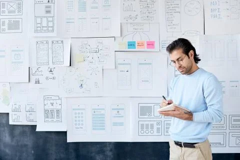 Professional App Developer Making Notes 库存照片