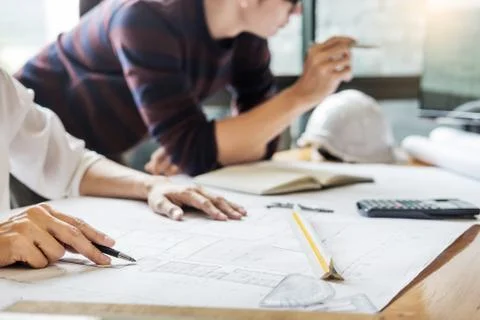 Professional architect designer structural engineer team colleagues working o Fotos de archivo