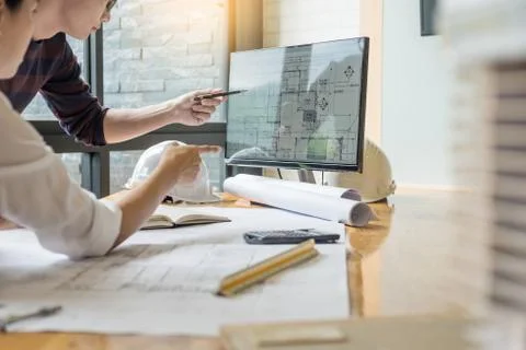 Professional architect designer structural engineer team colleagues working o Stock Photos