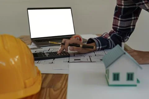 Professional architect designer structural engineer working with blueprint Stock Photos