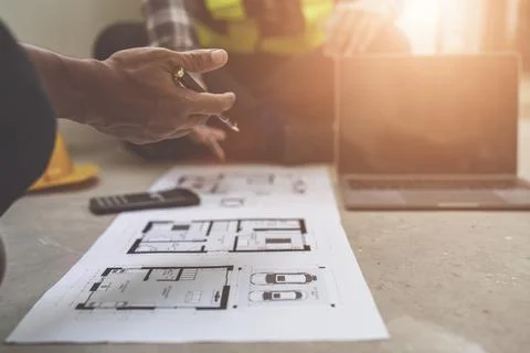 Professional architect designer structural engineer team colleagues discussing Stock Photos