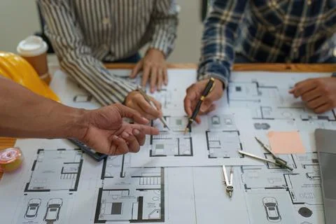 Professional architect designer structural engineer team colleagues discussing Fotos de archivo