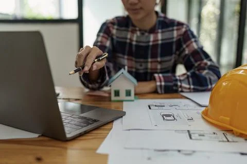 Professional architect designer structural engineer working with blueprint Stock Photos