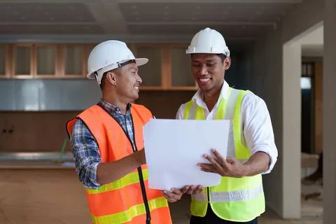 Professional architect designer structural engineer team colleagues discussing Fotos de archivo