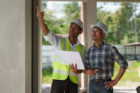 Professional architect designer structural engineer team colleagues discussing Fotos de archivo