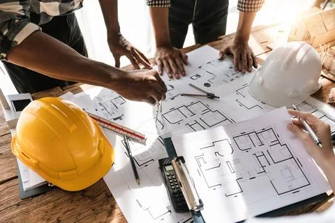 Professional architect designer structural engineer team colleagues working Fotos de archivo