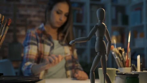 Professional artist drawing in her studio Stock Footage 90371288