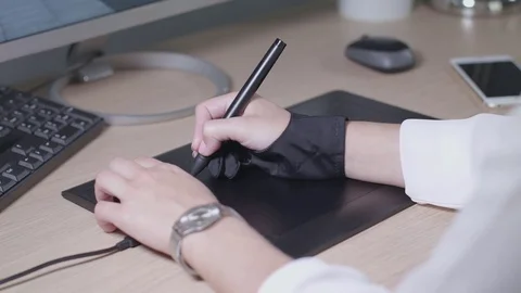 Professional artist draws on computer Stock Footage 84654983