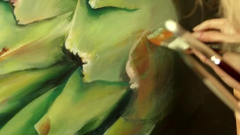 Professional artist working in her workshop studio - close-up video Stock Footage 82787420