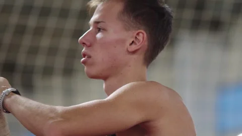 Professional athlete preparing for pole vault jump Stock Footage 318464610