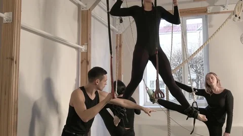 Professional athletes take up alfa gravity in the gym Stock Footage 82503156