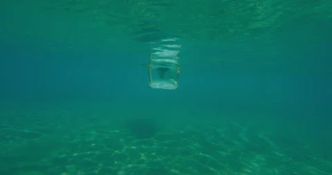 Professional athletic female surfer diving under ocean wave and swimming with su Stock Footage 199458673
