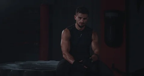 Professional athletic guy charismatic looking tired to the after a hard training Stock Footage 116901947