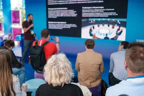 Professional Audience Attends Live Tech Conference Presentation With Large Stock Photos
