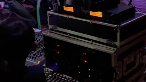 Professional audio amplifier rack and sound mixer setup Stock Footage 346561344