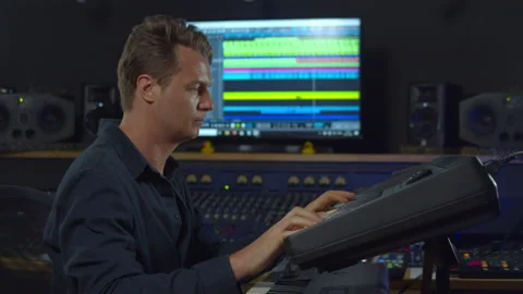 Professional Audio Engineer at work on radio produce podcast, Music Creator Stock Footage 140599689