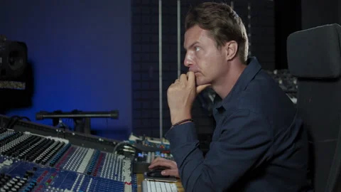 Professional Audio Engineer at work on radio produce podcast, Music Creator Stock Footage 140599817