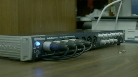 Professional Audio Interface with Cables on Desk Vídeos de archivo 343962986