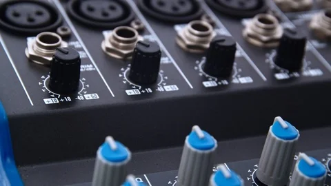 Professional audio mixer knobs input/output ports moving closeup 動画素材 117714904
