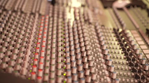 Professional audio mixing console close-up with rack focus Video stock 331418027