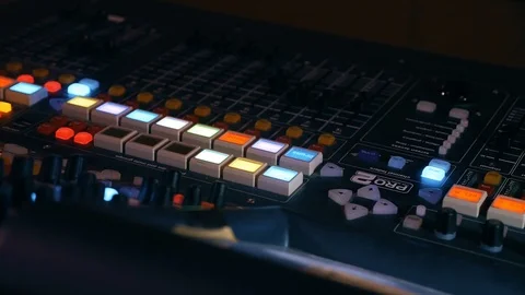 Professional audio mixing console with faders and knobs Stock Footage 111868345