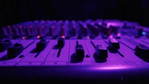 Professional Audio Mixing Console Faders Illuminated by Blue Studio Lighting Stockbeeldmateriaal 334736475