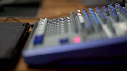 Professional Audio Mixing Console with Faders Close Up Stock Footage 346835152