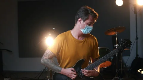 Professional audio studio. Man playing guitar. Life of musicians across the Stock Footage 138525128