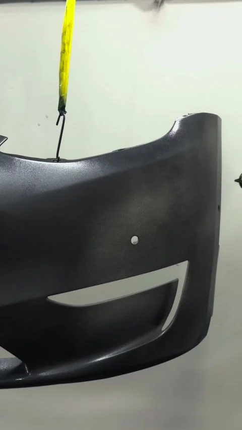Professional auto body painting process with spray gun in a clean workshop Stock Footage 341134751