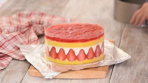 Professional baker making a strawberry cake. Stock Footage 156676818