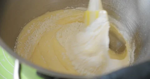 Professional baker preparing the cake batter, making cream. V2 Stock Footage 140405068