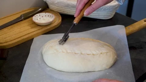 Professional Baker Shaping and Scoring Fermented Dough Stock Footage 340653138