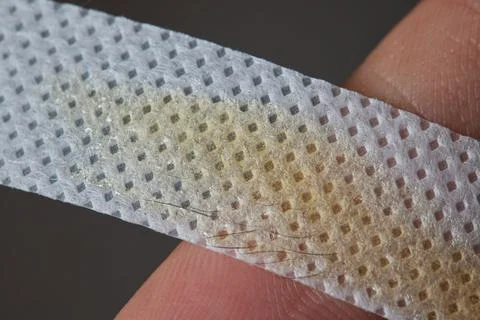 Professional barber doing threading procedure and correcting shape of eyebrows Stock Photos