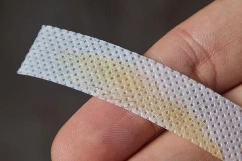 Professional barber doing threading procedure and correcting shape of eyebrows Stock Photos