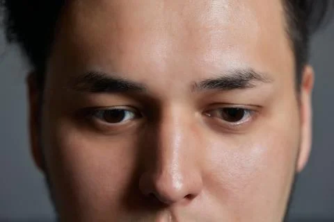 Professional barber doing threading procedure and correcting shape of eyebrows Stock Photos