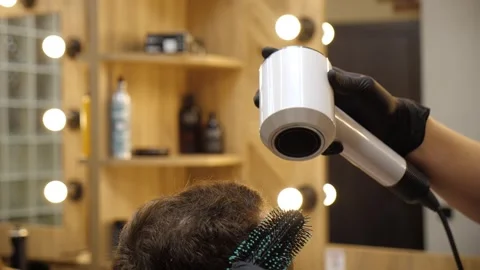 Professional Barber Drying Male Client Hair Stock Footage 333114482