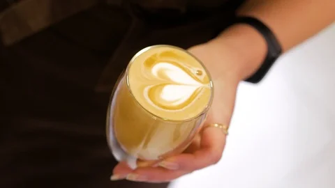Professional barista making pouring stream milk with beautiful latte art pattern Stock Footage 106817078
