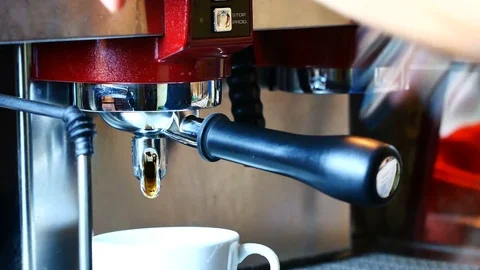 A professional Barista Use a coffee machine to BREW coffee at a customer orde Stock Footage 76896855