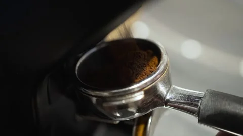 Professional barista worker use grinder machine to grind fresh coffee beans for 스톡 동영상 285152930