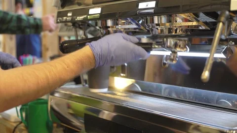 Professional barista, working at the bar. Making coffee in the coffee machine Stock Footage 80220050