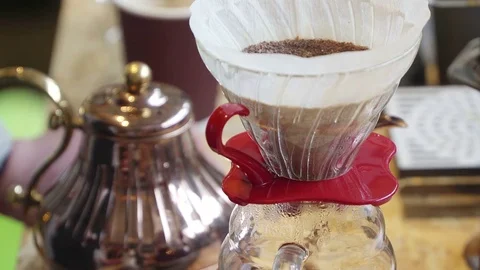 Professional barista, working at the bar. Making filter coffee machine. Drops Stock Footage 81758022