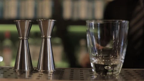Professional Bartender Juggling Glass Stock Footage 129781830